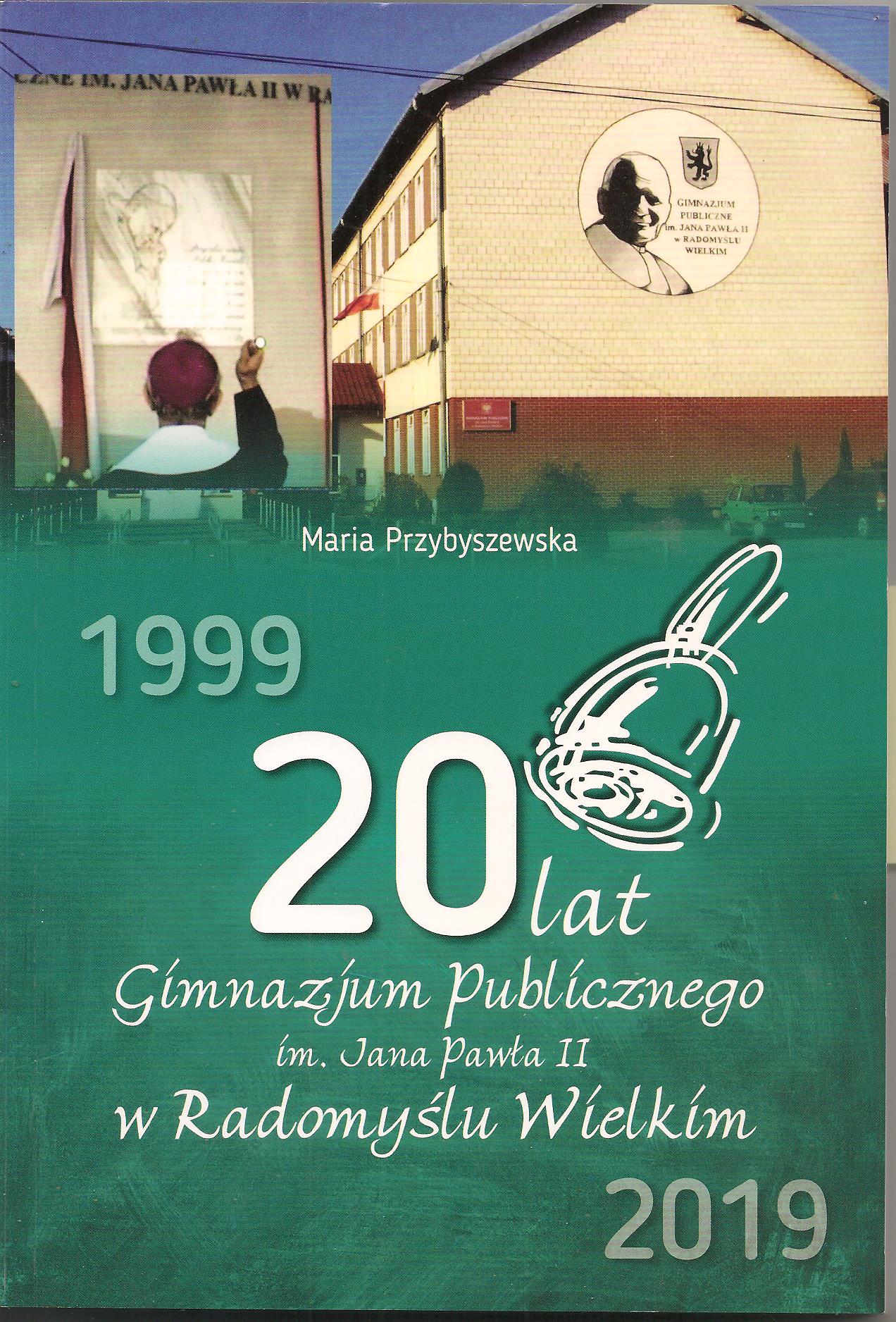 Okładka książki ze zdjęciem budynku.