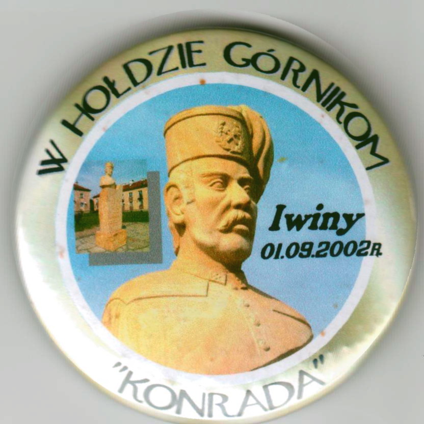 Odznaka z wizerunkiem posągu.